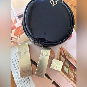 cle de peau 3pcs (cleanser/toner/face cream)+ free bag